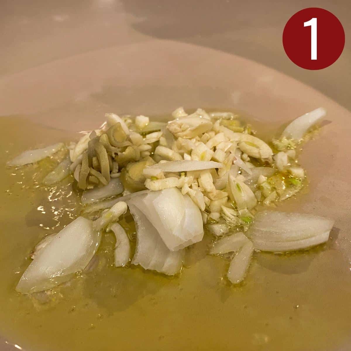 Step 1 add aromatics for Filipino Chicken Curry