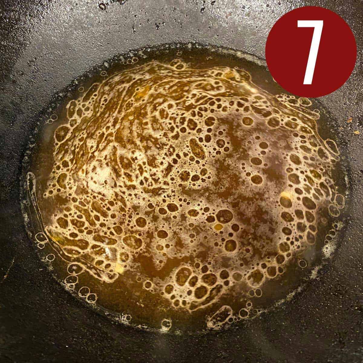 Step 7 hot liquid in a wok.