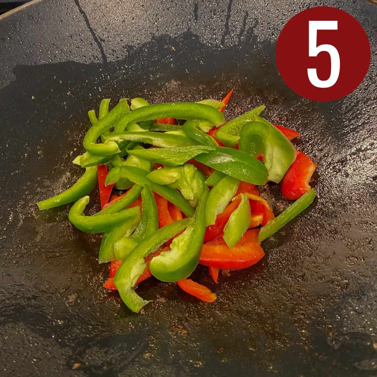 Step 5 sliced red and green bell peppers in a skillet.