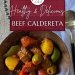 Beef Caldereta in a brown wooden bowl for Pinterest.