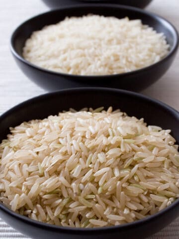 Rice in a black bowl.