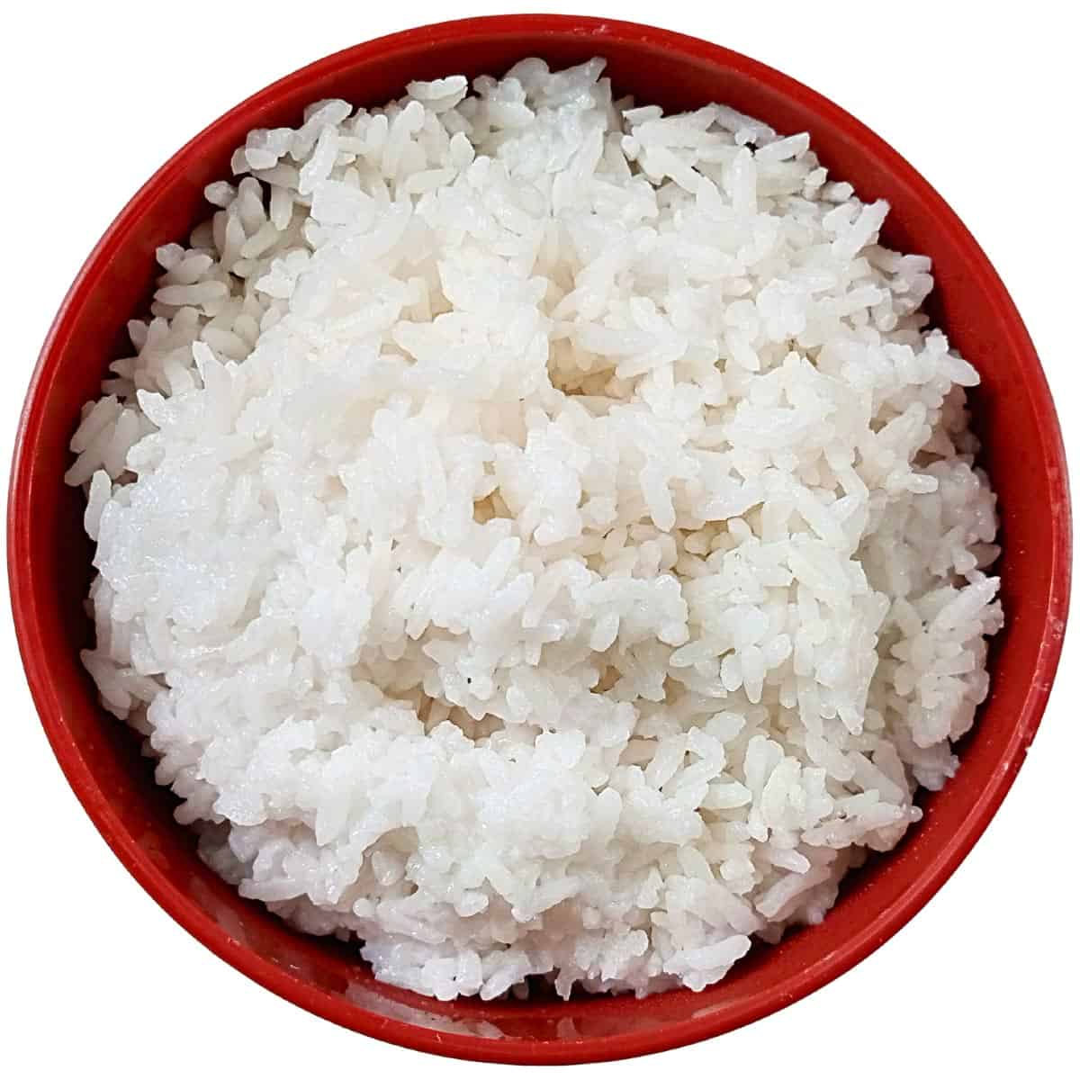 Steamed white rice in a red bowl.