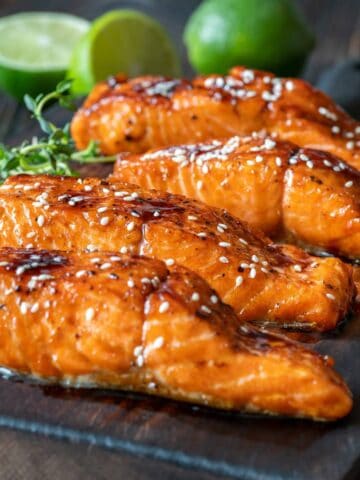 Cooked salmon filets with sesame seeds.